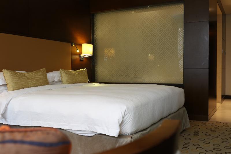 Asiana Hotel Dubaj Exteriér fotografie A bedroom at the hotel